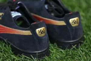 Young's Crown logo features on the back of the shoes. Photo supplied by Puma