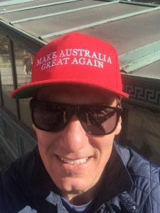Cory Bernardi wearing a make Australian Great Again cap.